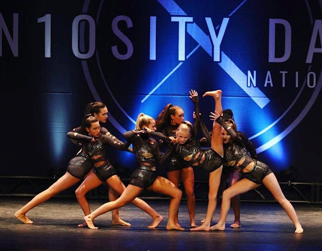 a group of people on a stage