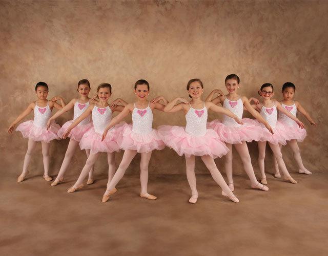 a group of kids posing for a photo
