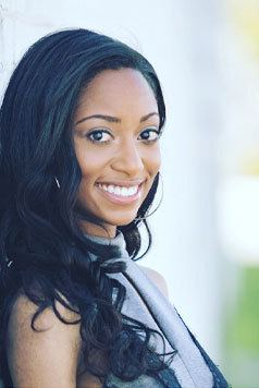 a woman smiling for the camera