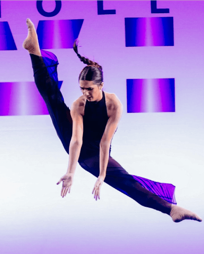 a woman wearing a purple dress