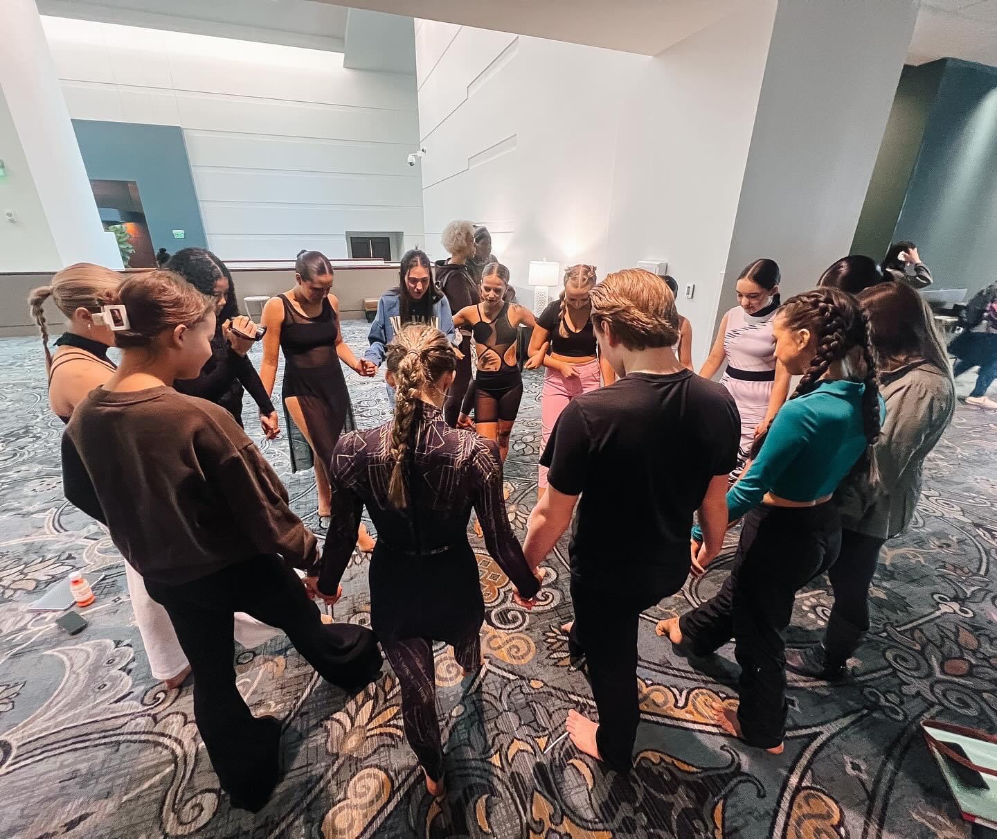 a group of people standing in front of a crowd